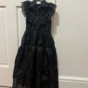 Wednesday costume used work once. Practically new.